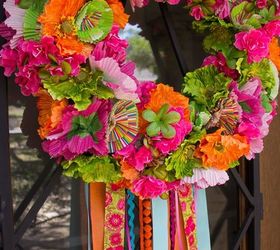 31 clever ideas to reuse muffin pans and cupcake liners, Hang A Colorful Paper Wreath