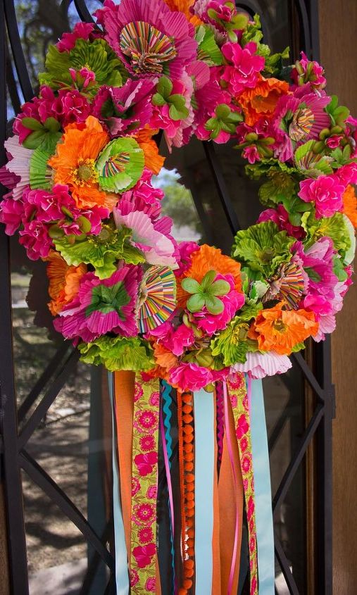 31 clever ideas to reuse muffin pans and cupcake liners, Hang A Colorful Paper Wreath