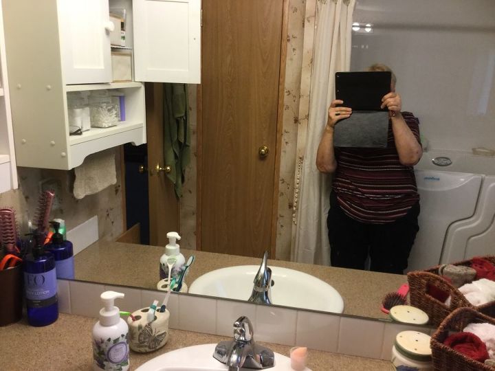 q any suggestions for a large bathroom mirror that i can t remove