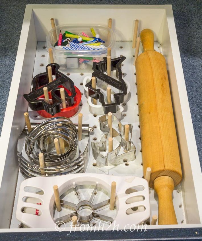 s 15 kitchen updates under 20, Place Baking Supplies On Pegs