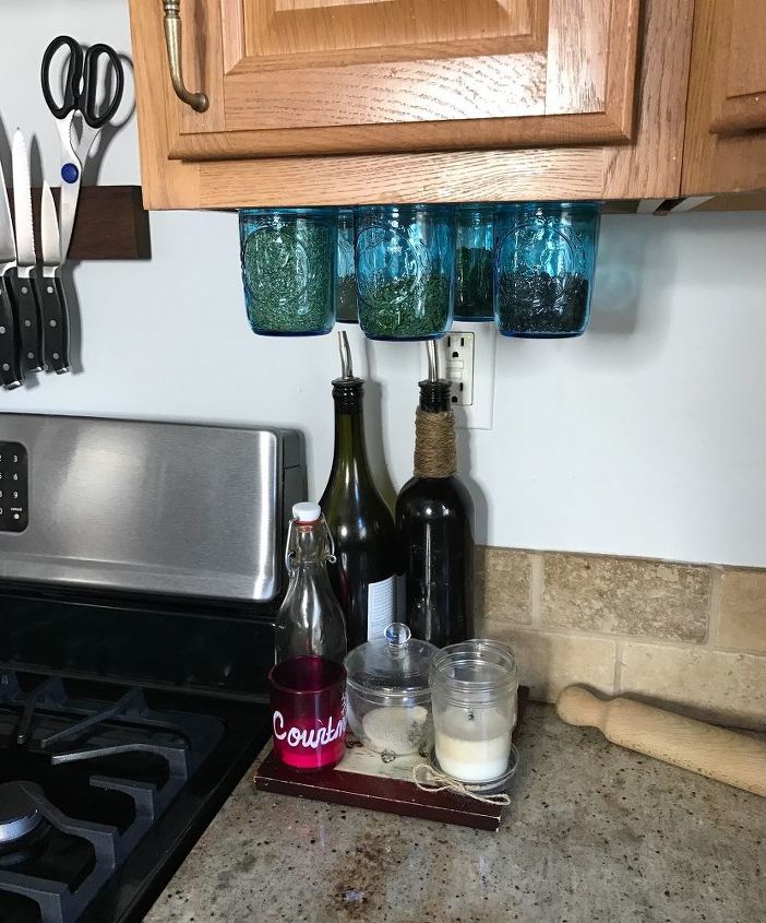 s 15 kitchen updates under 20, Drill Mason Jars In For Spice Storage