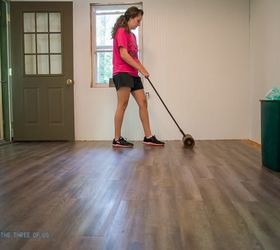 s 15 fabulous ways to pretty up your flooring for less, Put Down Laminate Flooring