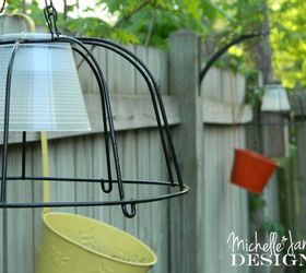 s 16 stunning ways for you to add solar lighting, Combine A Hanging Planter And Solar Lamps
