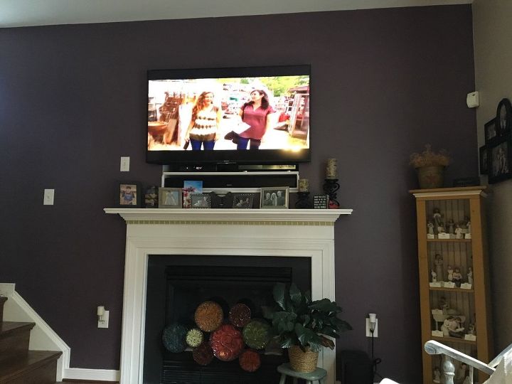 q want to add some flare above fireplace