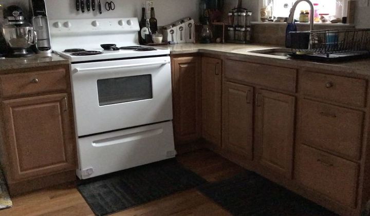 stick command hooks under your kitchen cabinets for genius lighting