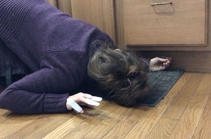 stick command hooks under your kitchen cabinets for genius lighting