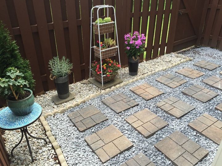 s 15 inexpensive tricks to help you landscape without stressing out, Pull Out Weeds For Paving Rocks