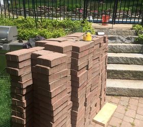 Homeowners rip out their patio, then buy 100 pavers for this amazing update