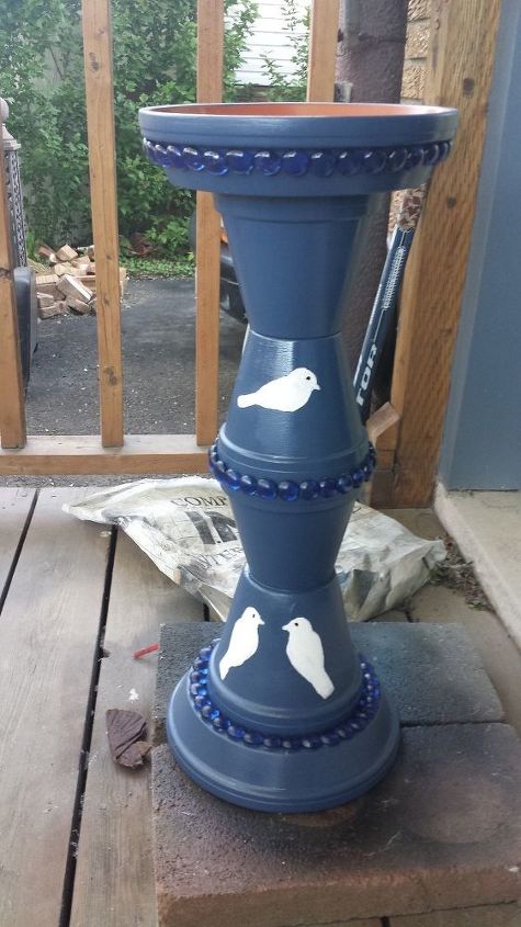 s 29 ways to get a splash of blue in your house, Stack Blue Painted Pots For A Birdfeeder