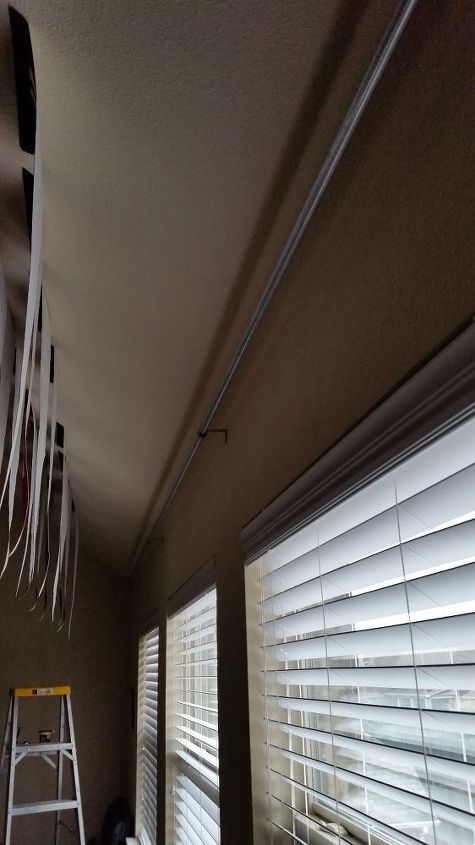barra de cortina barata para una fila larga de ventanas