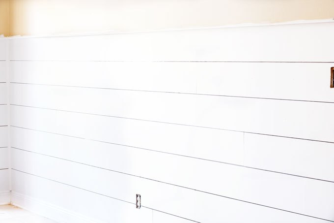 12 super affordable shiplap wall projects to beautify your home, Hammer In Plywood Sheets For 150