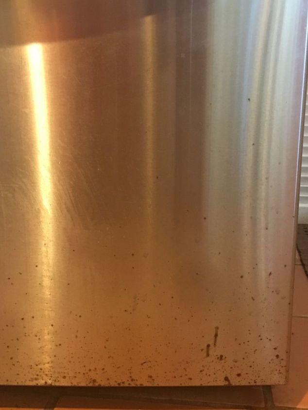 how can brown spots on stainless steel be cleaned