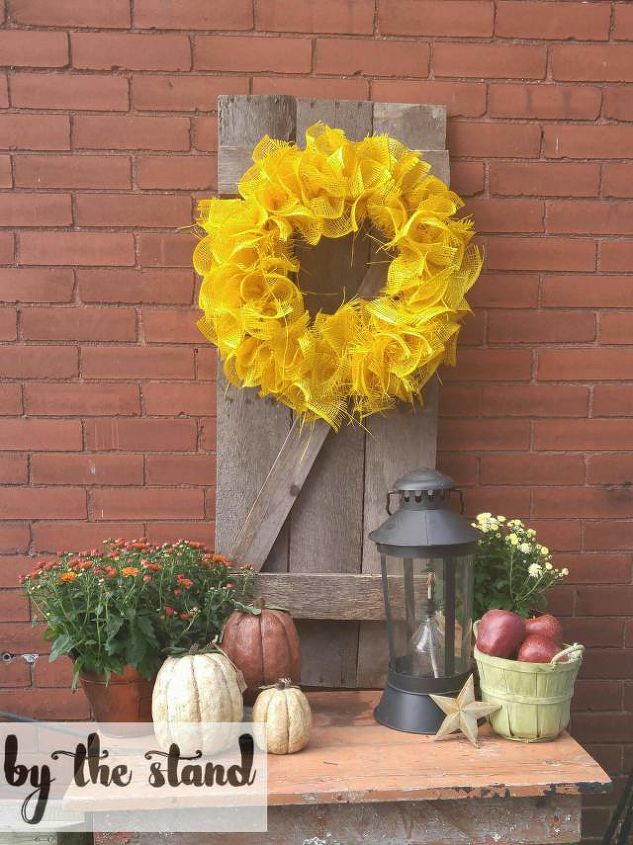 s 13 enjoyable burlap wreaths that ll make you smile when you see them, Top A Rustic Shutter With Yellow Burlap