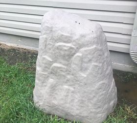 q faux boulder rain catcher