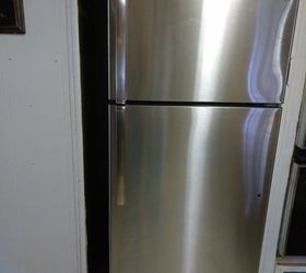 skinny shelf next to fridge gap