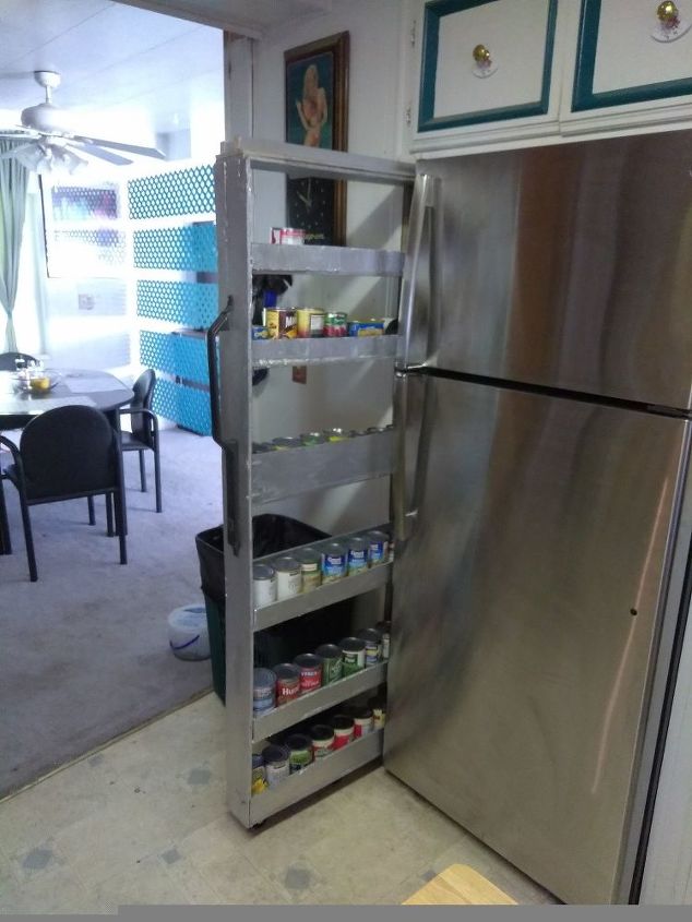 skinny shelf next to fridge gap