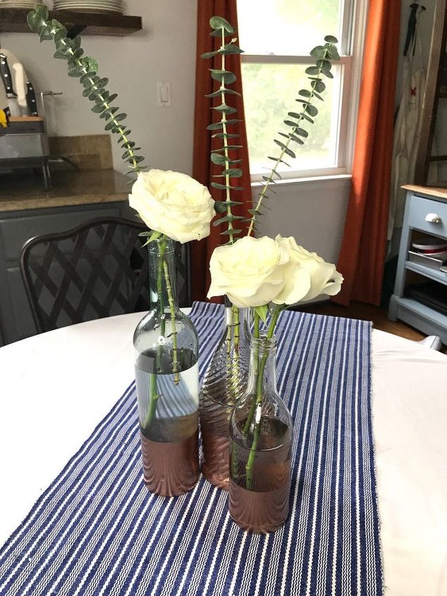 5 ways to use old wine bottles in your garden