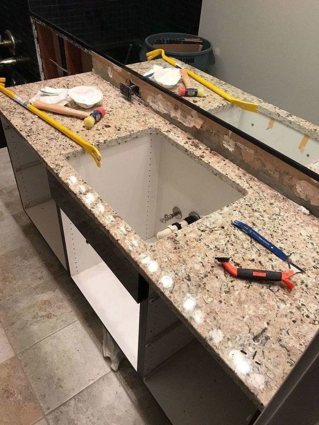 removing a bathroom sink and vanity