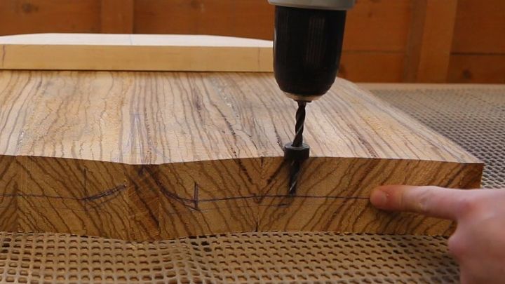 carved workshop stool for alec steele