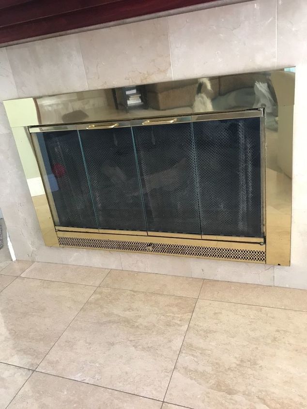 how do you take the metal brass on the outside of your fireplace off
