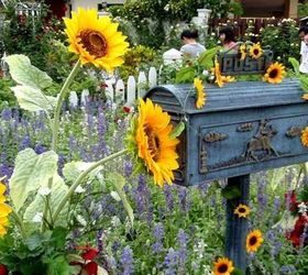 try these gorgeous ideas and the mailman will never miss your mailbox, Plant A Gorgeous Flowerbed Around The Post