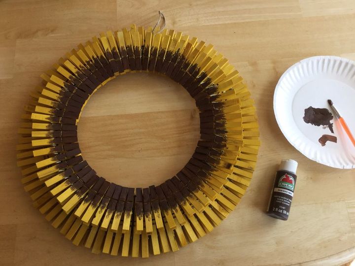 s turn a dollar store laundry basket into a wreath form, Step 7 Apply brown paint on first layer