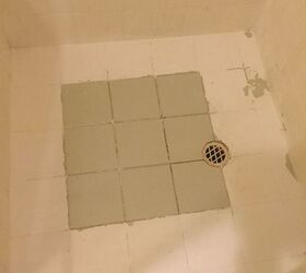 my husband painted our bathroom tiles