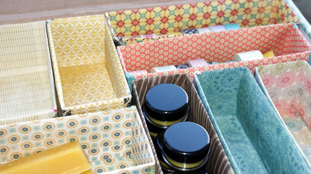 s 26 wonderful ways you can use scrapbooking paper, Declutter With Pretty Repurposed Organizers