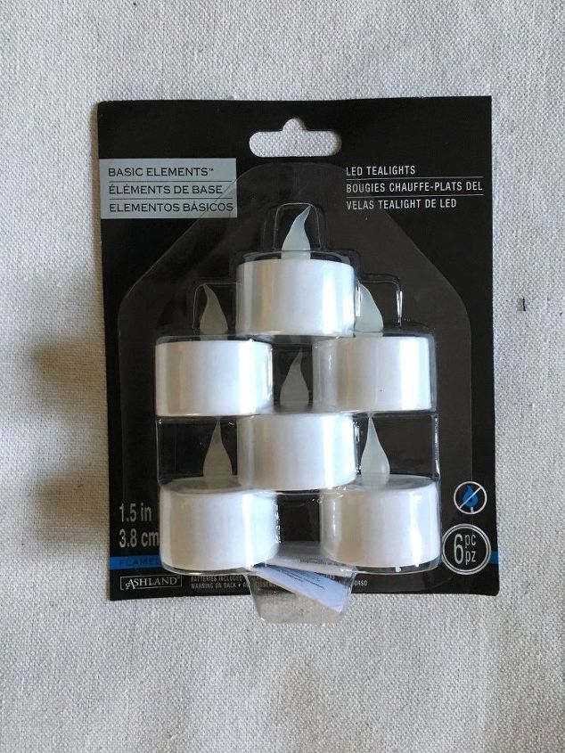 s transform tuna cans into gorgeous lighting in 9 simple steps, Step 9 Grab some tea lights