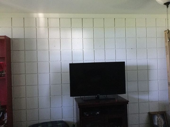 q i rent but want to change or disguise a block wall what can i do