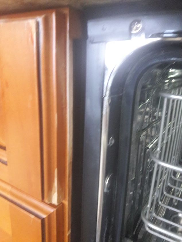 condensation on top of ge dishwasher causing cabinet damage