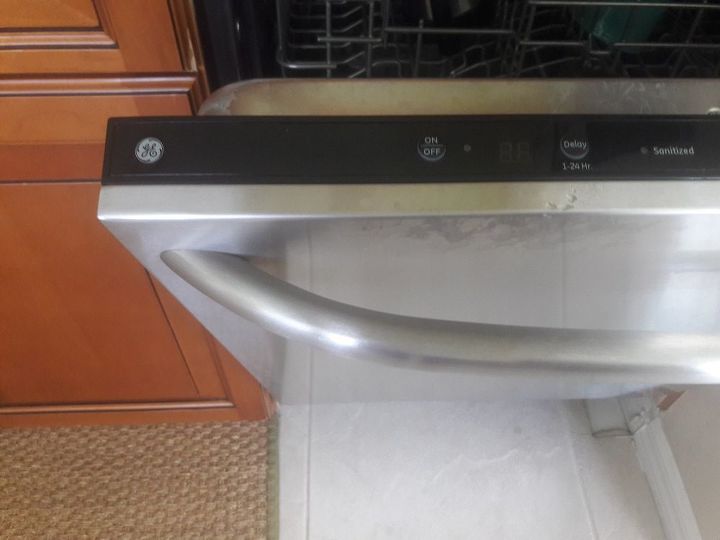 condensation on top of ge dishwasher causing cabinet damage
