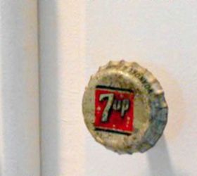 s save your bottle caps for these x crazy cool ideas, A Chic Vintage Kitchen Cabinet Knob