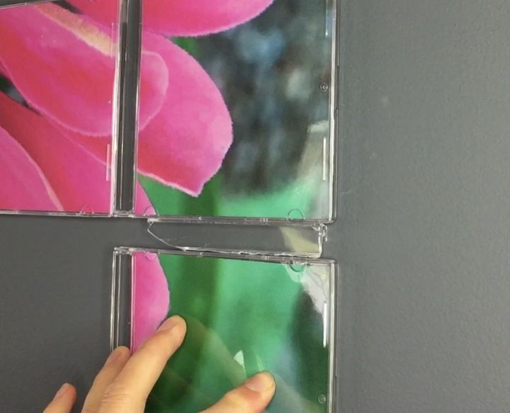 use your old cd cases for creative wall art