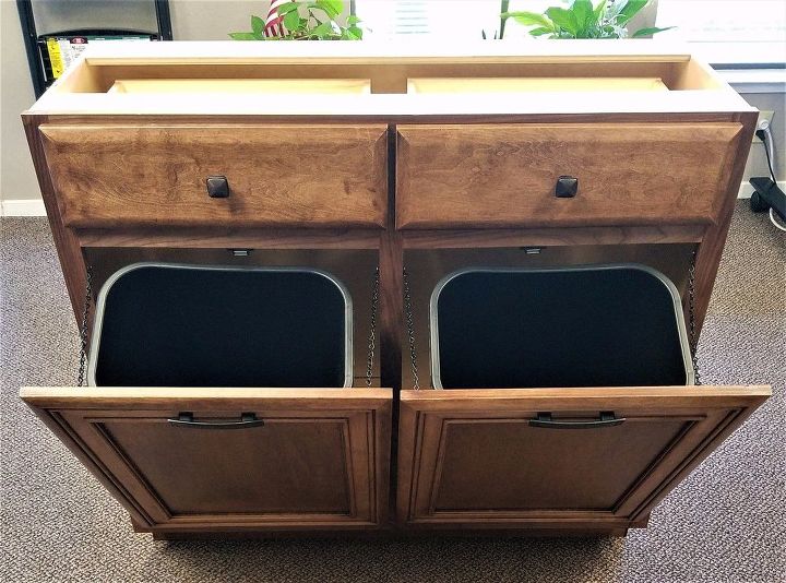 looking to hide your unsightly trash bins why not do so by blending them