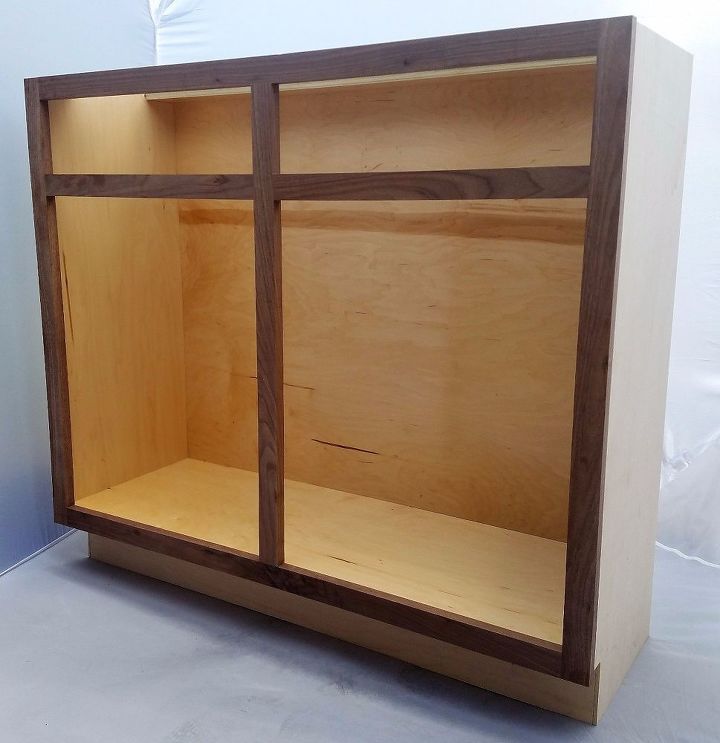 looking to hide your unsightly trash bins why not do so by blending them