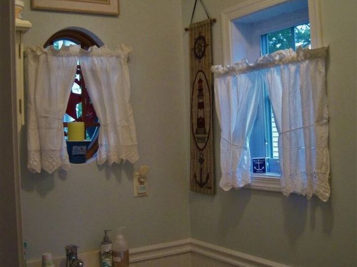 q how can i best decorate these windows in my powder room