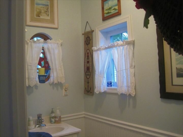 q how can i best decorate these windows in my powder room