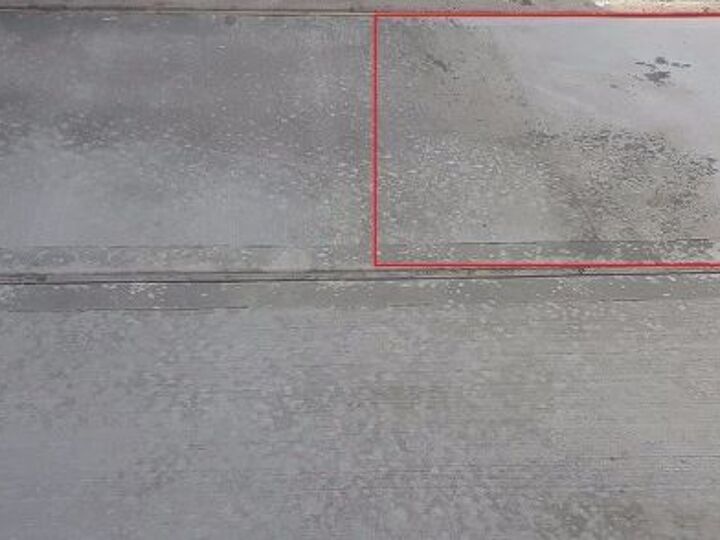 q multiple discolorations in newly poured concrete slab