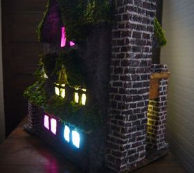 casa embrujada de arcilla con luces