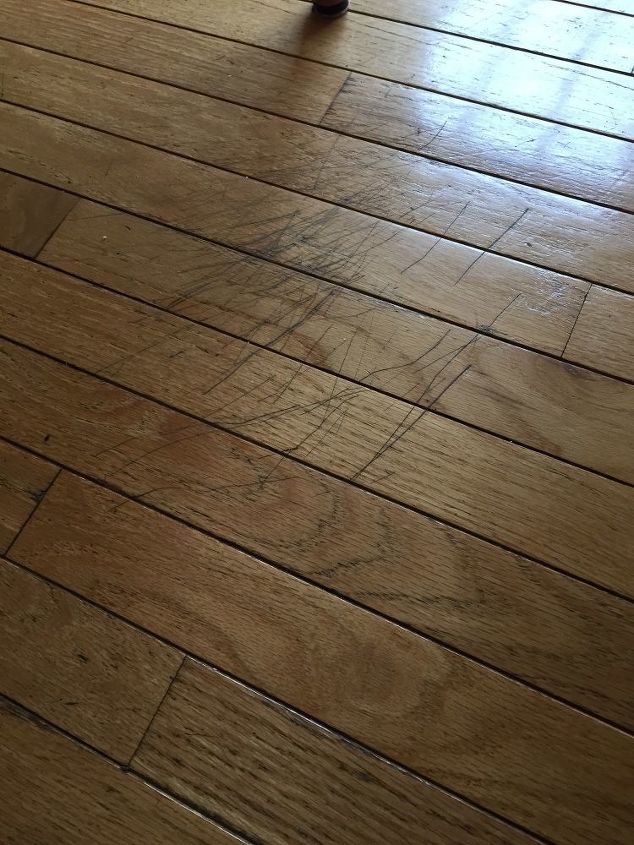 q how do i get rid of scratches on my wooden floor without redoing the