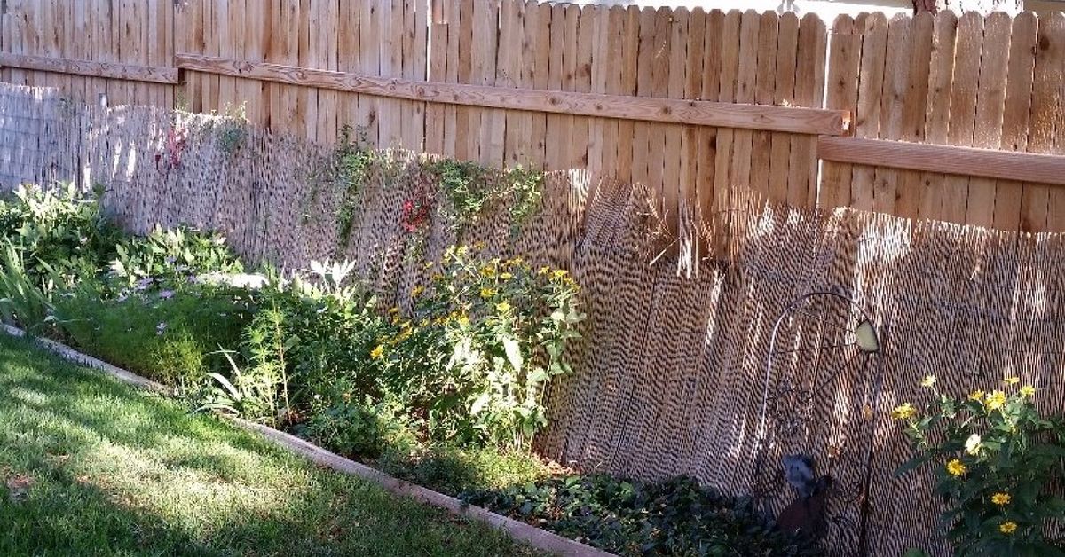 Making pretty from neighbors ugly fence. | Hometalk