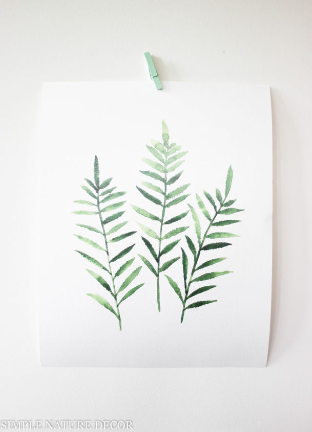 hanging botanical prints with clothes pins