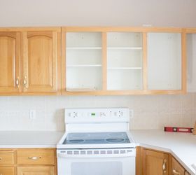 the amazing 10 dollar mini kitchen makeover no cabinet painting, Rehanging Cabinets