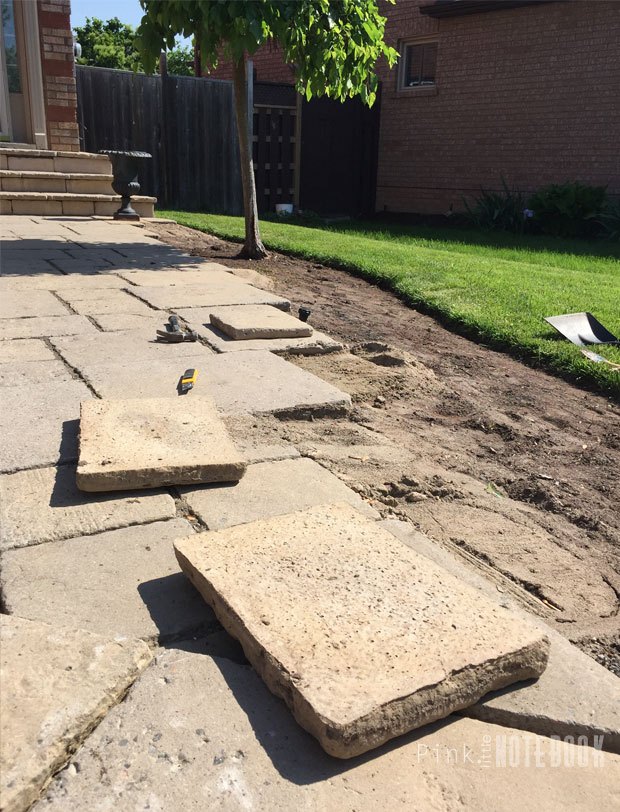 fixing a walkway with sinking stones