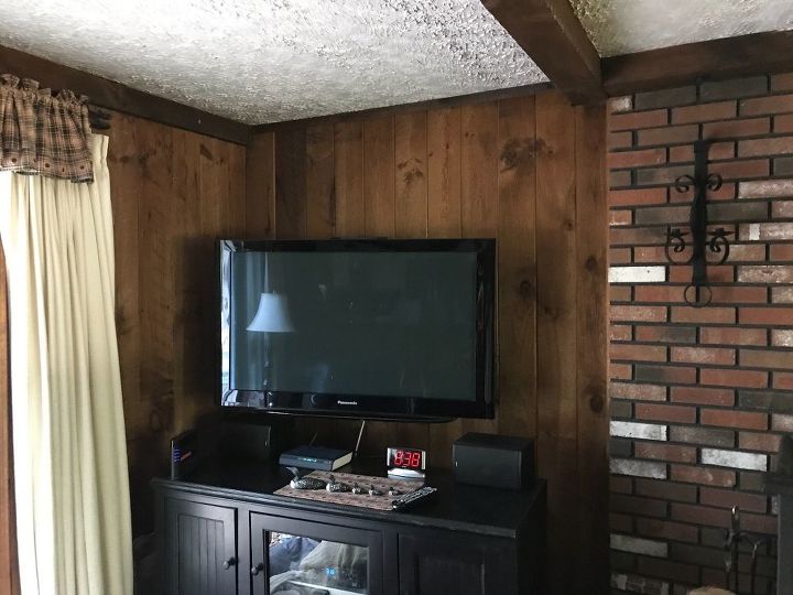 q how can i best paint stain the paneling in my dark family room