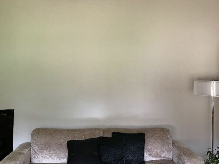 q we are challenged in how to decorate this wall in our living room