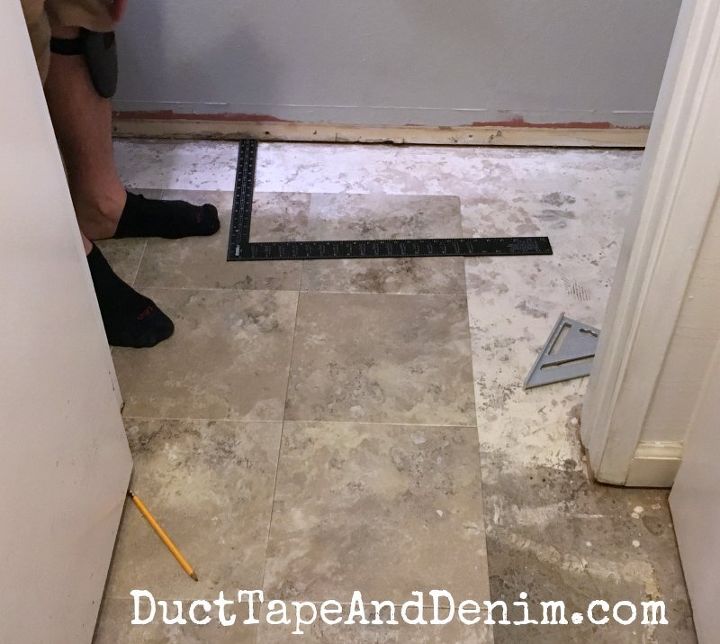 why we used vinyl peel and stick tiles in our powder room and hall