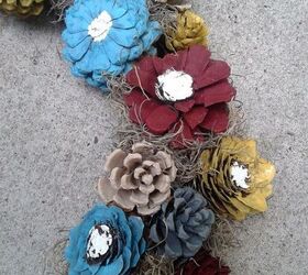 turn your dried out pine cones into a beautiful flower wreath