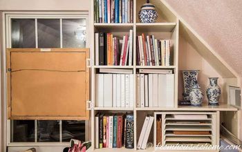 How To Hang Art On A Bookshelf And Still Have Easy Access To The Books